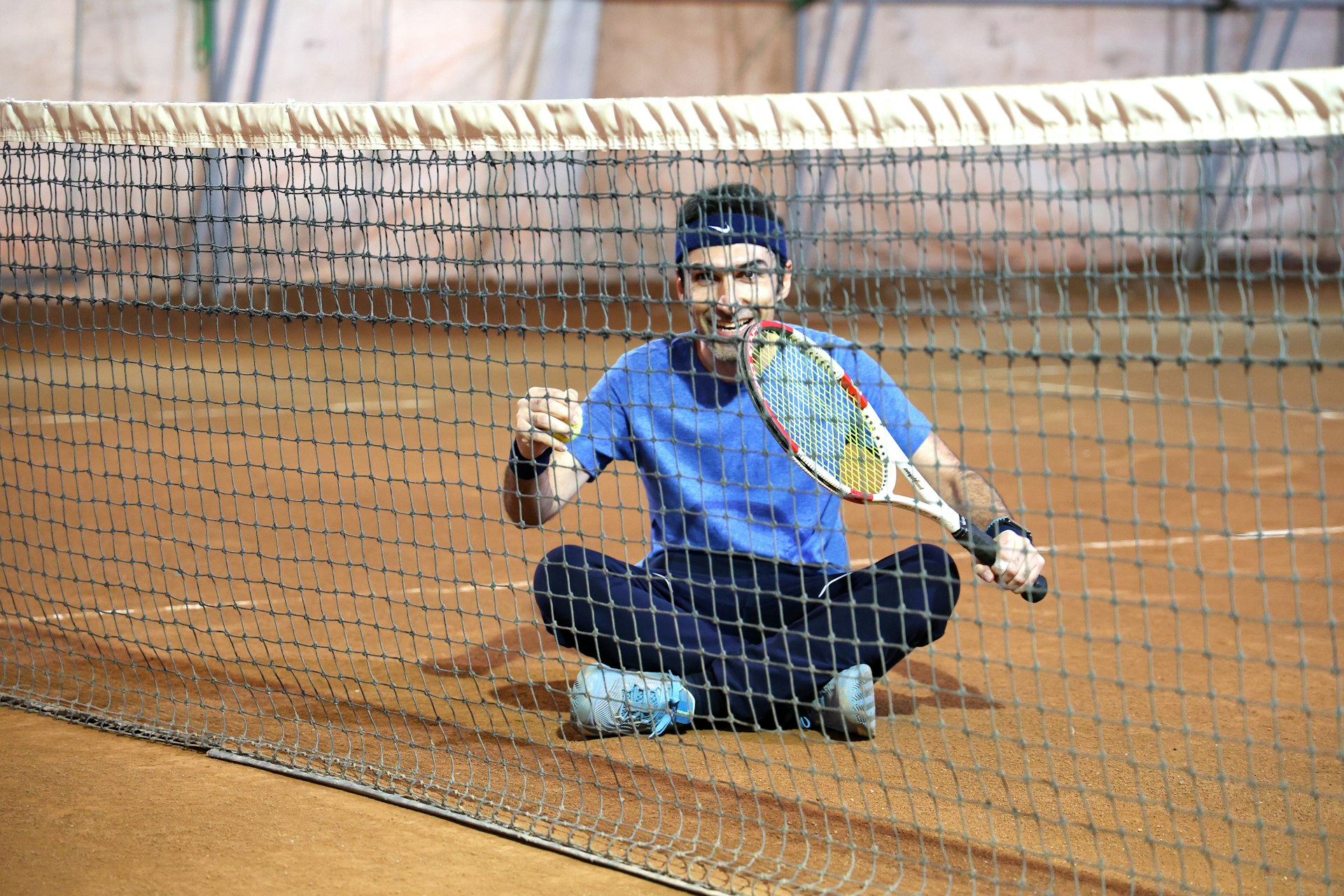 Tennis victory celebration